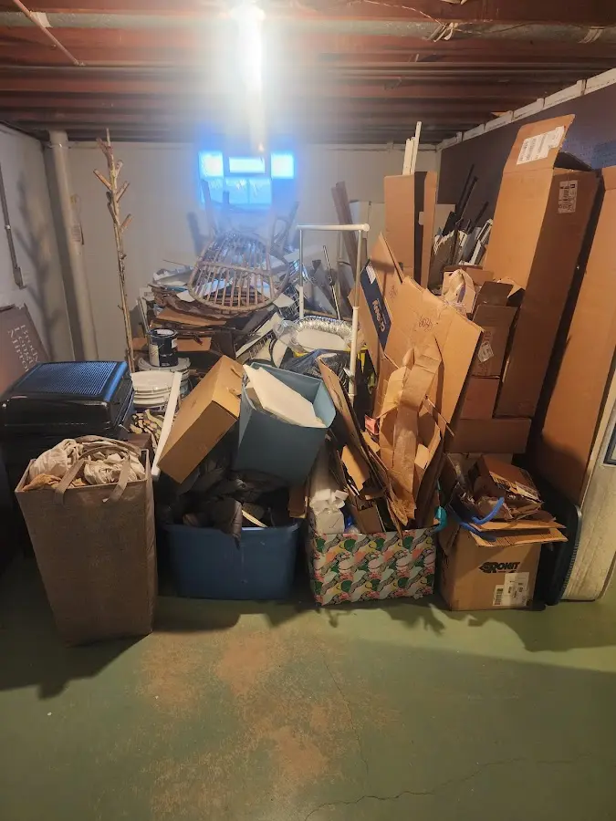 Roll-off dumpster container at job site for 8 Yard Dumpster Rental in Rib Mountain